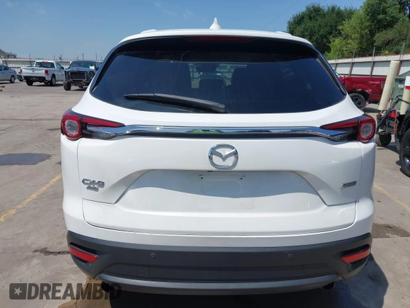 2019 Mazda CX-9 Touring z VIN JM3TCBCY2K0300702, wystawiony jako IAAI lot #42194050 z przebiegiem 98 247 mil mil oraz . Historia ofert i sprzedaży dostępna na DreamBid. Obrazek 17.