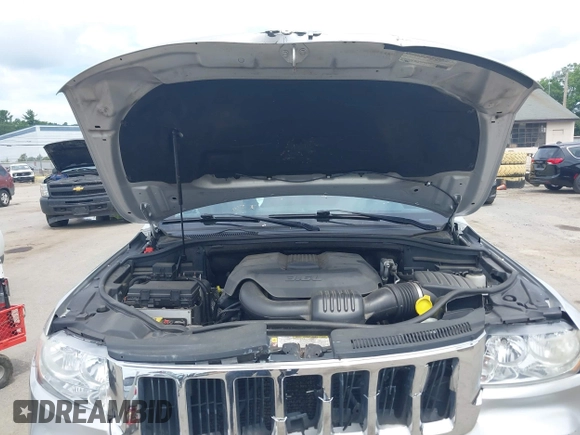 2011 Jeep Grand Cherokee Laredo with VIN 1J4RR4GG3BC734683, listed as a IAAI auction lot 42656716 with 151,220 mi miles and . Bid and sale history available at DreamBid. Image 10.