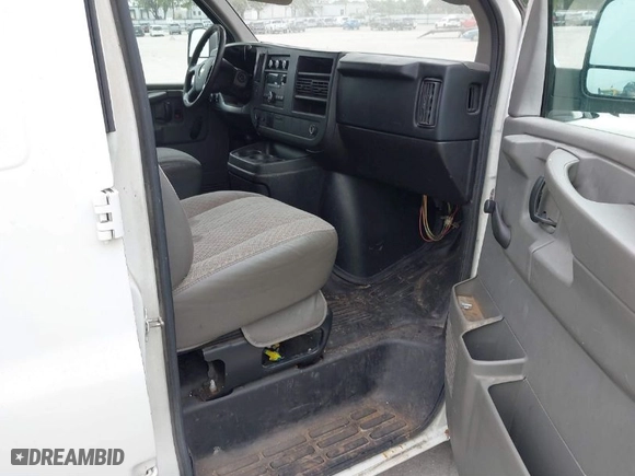 2012 Chevrolet Express Cargo Van with VIN 1GCSGAFX7C1124523, listed as a IAAI auction lot 40328756 with 266,445 mi miles. Bid and sale history available at carsss.com. Image 5.