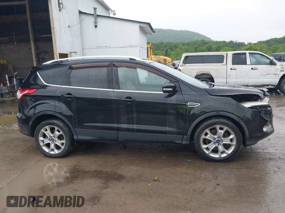 2015 Ford Escape Titanium с VIN 1FMCU9J95FUA75924, выставлен на аукционе IAAI как лот 42329222 с пробегом 123 817 миль миль и . История ставок и продаж доступна на DreamBid. Изображение 13.