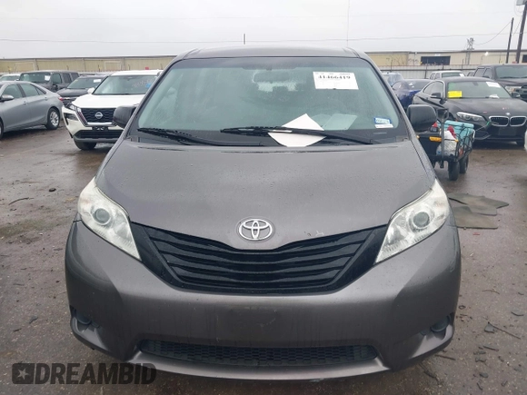 2015 Toyota Sienna L with VIN 5TDZK3DC9FS563593, listed as a IAAI auction lot 41466419 with 136,394 mi miles and . Bid and sale history available at DreamBid. Image 12.