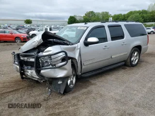 2011 Chevrolet Suburban LT z VIN 1GNSKJE36BR235620, wystawiony jako Copart lot #56947335 z przebiegiem 170 378 mil mil oraz Czysty tytuł • Clean title. Historia ofert i sprzedaży dostępna na DreamBid. Obrazek 1.
