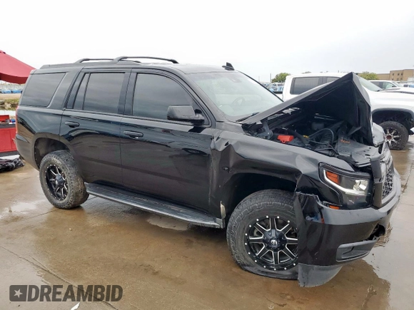 2018 Chevrolet Tahoe LT with VIN 1GNSCBKC3JR351640, listed as a Copart auction lot 50493995 with 135,603 mi miles and Salvage title. Bid and sale history available at DreamBid. Image 4.