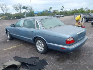 2002 Jaguar XJ VDP with VIN SAJDA24C32LF45422, listed as a IAAI auction lot 41654187 with 64,726 mi miles. Bid and sale history available at carsss.com. Image 3.