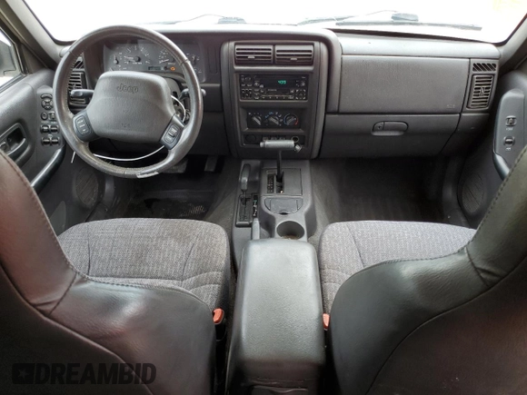 2001 Jeep Cherokee Sport with VIN 1J4FF48S31L520760, listed as a Copart auction lot 59807625 with 298,489 mi miles and Salvage title. Bid and sale history available at DreamBid. Image 8.