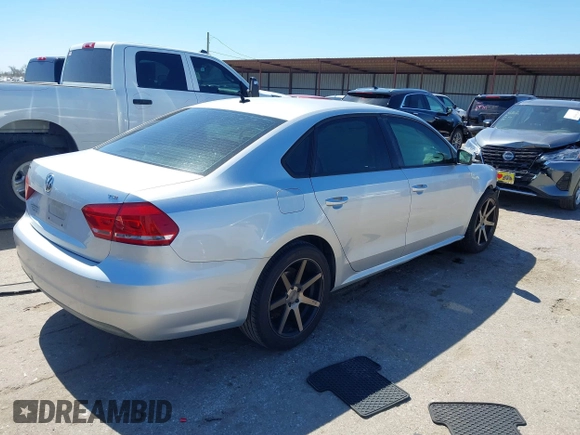 2015 Volkswagen Passat 1.8T Limited Edition with VIN 1VWAT7A30FC014689, listed as a IAAI auction lot 41758748 with 140,545 mi miles. Bid and sale history available at carsss.com. Image 4.