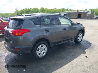 2015 Toyota RAV4 LE with VIN JTMBFREV2FD104409, listed as a IAAI auction lot 42084145 with 102,948 mi miles and . Bid and sale history available at DreamBid. Image 4.
