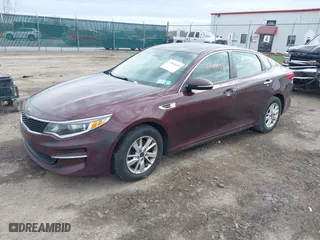 2016 Kia Optima LX with VIN 5XXGT4L36GG108599, listed as a IAAI auction lot 42065639 with 127,387 mi miles. Bid and sale history available at carsss.com. Image 17.