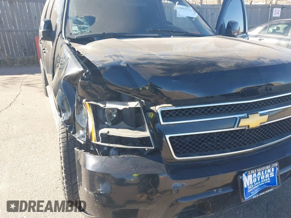 2013 Chevrolet Suburban LS with VIN 1GNSKHE76DR155667, listed as a IAAI auction lot 41053774 with 118,655 mi miles. Bid and sale history available at carsss.com. Image 6.