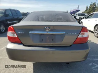 2004 Toyota Camry LE z VIN 4T1BE32K34U881717, wystawiony jako Copart lot #53731565 z przebiegiem Nie podano mil oraz Szkoda całkowita • Salvage title. Historia ofert i sprzedaży dostępna na DreamBid. Obrazek 6.