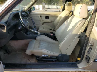 1987 BMW 3 Series z VIN WBAAA1301H2322047, wystawiony jako Copart lot #79020694 z przebiegiem 109 092 mil mil oraz Nie do naprawy • Non repairable. Historia ofert i sprzedaży dostępna na DreamBid. Obrazek 7.