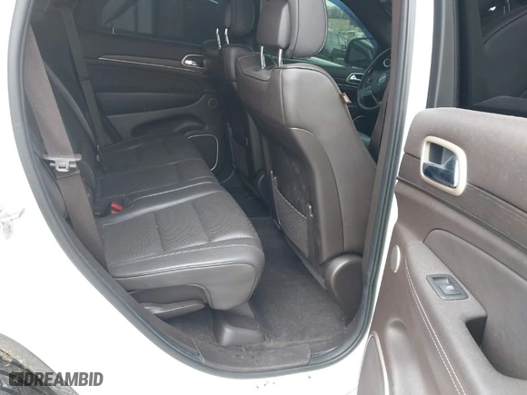 2014 Jeep Grand Cherokee Summit with VIN 1C4RJFJT7EC248008, listed as a IAAI auction lot 41490388 with 171,672 mi miles. Bid and sale history available at carsss.com. Image 8.