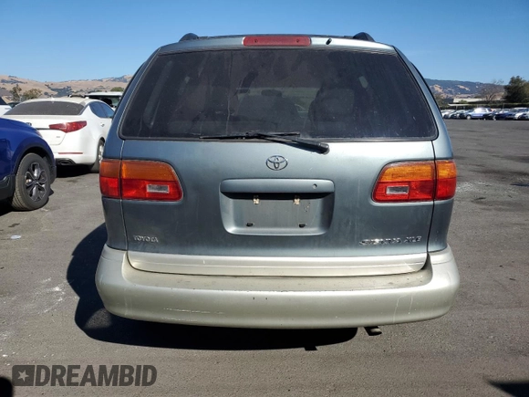 1998 Toyota Sienna LE with VIN 4T3ZF13C5WU085729, listed as a Copart auction lot 77256524 with 161,508 mi miles and Salvage Title. Bid and sale history available at carsss.com. Image 6.