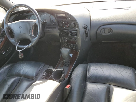 1999 Oldsmobile Aurora with VIN 1G3GR62C7X4109461, listed as a Copart auction lot 75916764 with 107,690 mi miles and Salvage Title. Bid and sale history available at DreamBid. Image 8.