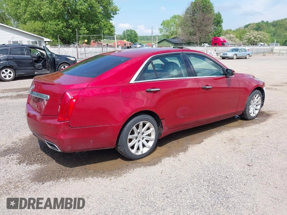 2014 Cadillac CTS AWD z VIN 1G6AW5SX3E0129127, wystawiony jako IAAI lot #42193399 z przebiegiem 108 037 mil mil oraz . Historia ofert i sprzedaży dostępna na DreamBid. Obrazek 4.