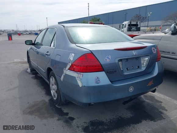2007 Honda Accord Sdn LX with VIN 1HGCM56407A042456, listed as a IAAI auction lot 41697400 with 281040 miles. Bid and sale history available at carsss.com. Image 3.