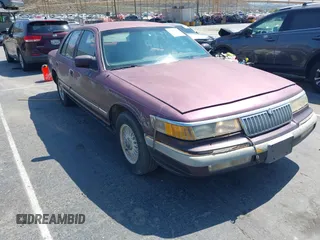 1992 Mercury Grand Marquis LS z VIN 2MECM75W4NX749141, wystawiony jako IAAI lot #42413769 z przebiegiem 296 805 mil mil oraz . Historia ofert i sprzedaży dostępna na DreamBid. Obrazek 1.