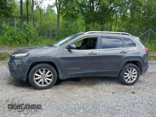 2014 Jeep Cherokee Limited with VIN 1C4PJMDB2EW216225, listed as a IAAI auction lot 42672551 with 151,799 mi miles and . Bid and sale history available at DreamBid. Image 14.