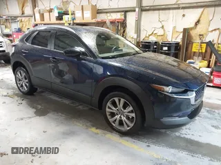 2022 Mazda CX-30 S Select z VIN 3MVDMBBL0NM440747, wystawiony jako IAAI lot #41864038 z przebiegiem 9667 mil mil oraz . Historia ofert i sprzedaży dostępna na DreamBid. Obrazek 1.