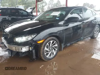 2016 Honda Civic Sedan EX with VIN 2HGFC2F81GH509046, listed as a IAAI auction lot 41542162 with 128,430 mi miles. Bid and sale history available at carsss.com. Image 2.