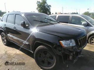 2011 Jeep Grand Cherokee Laredo with VIN 1J4RR4GG4BC558193, listed as a IAAI auction lot 40055870 with 110,939 mi miles. Bid and sale history available at carsss.com. Image 1.