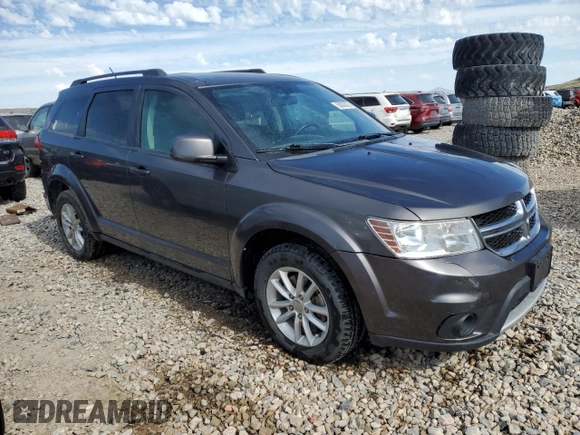 2015 Dodge Journey SXT with VIN 3C4PDDBG2FT684520, listed as a Copart auction lot 58835535 with 101,763 mi miles and Salvage title. Bid and sale history available at DreamBid. Image 4.