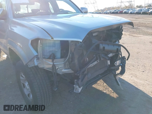 2017 Toyota Tacoma SR z VIN 5TFSX5EN9HX057404, wystawiony jako IAAI lot #40831578 z przebiegiem 91 434 mil mil oraz . Historia ofert i sprzedaży dostępna na DreamBid. Obrazek 17.