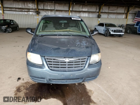 2006 Chrysler Town & Country with VIN 1A4GP45R46B713077, listed as a Copart auction lot 53140055 with 165,433 mi miles and Salvage Title. Bid and sale history available at DreamBid. Image 5.