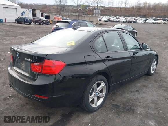 2014 BMW 3 Series 320i xDrive with VIN WBA3C3G59ENS70388, listed as a IAAI auction lot 41962815 with 195,393 mi miles. Bid and sale history available at carsss.com. Image 4.