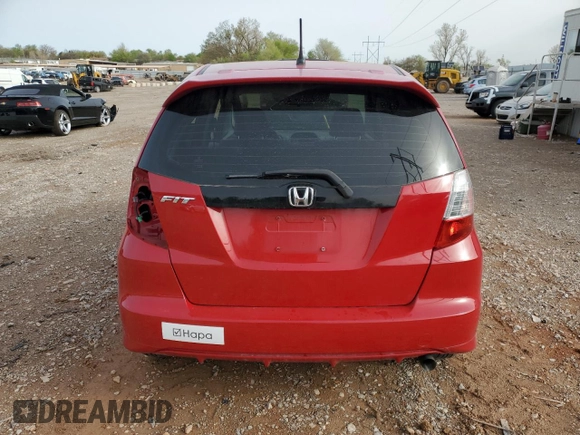 2009 Honda Fit with VIN JHMGE882X9S014265, listed as a Copart auction lot 51140695 with 130,809 mi miles and Salvage Title. Bid and sale history available at carsss.com. Image 6.