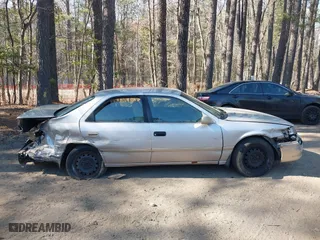 2000 Toyota Camry CE with VIN 4T1BG22K7YU633335, listed as a IAAI auction lot 41912171 with 334,068 mi miles. Bid and sale history available at carsss.com. Image 13.