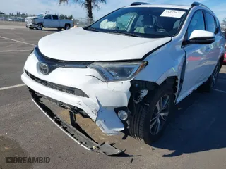 2018 Toyota RAV4 XLE with VIN 2T3WFREV8JW425027, listed as a IAAI auction lot 41272635 with 79,445 mi miles. Bid and sale history available at carsss.com. Image 6.