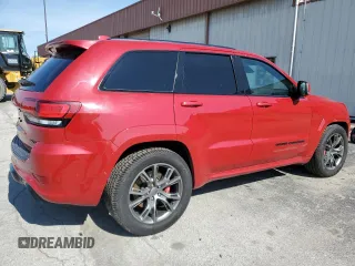2020 Jeep Grand Cherokee with VIN MV1N3849221ND, listed as a Copart auction lot 63821662 with 19,690 mi miles and Salvage title. Bid and sale history available at DreamBid. Image 4.