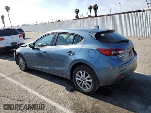 2015 Mazda 3 i Grand Touring with VIN JM1BM1M77F1247075, listed as a Copart auction lot 54559925 with 104,671 mi miles and Salvage title. Bid and sale history available at DreamBid. Image 2.