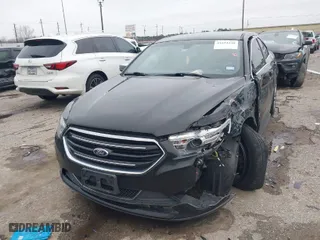 2013 Ford Taurus Limited with VIN 1FAHP2F81DG161158, listed as a IAAI auction lot 41622230 with 159,037 mi miles. Bid and sale history available at carsss.com. Image 2.
