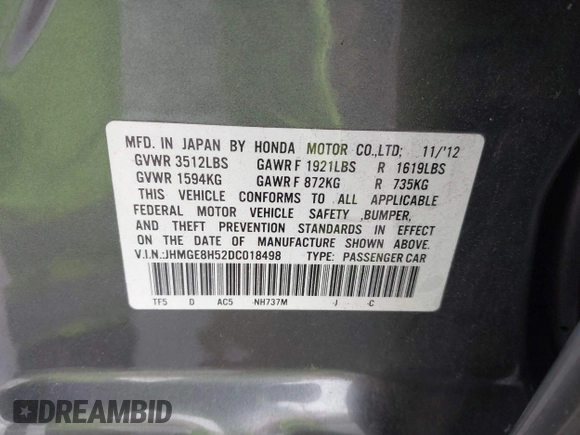2013 Honda Fit Sport with VIN JHMGE8H52DC018498, listed as a IAAI auction lot 41935157 with 111,922 mi miles. Bid and sale history available at carsss.com. Image 9.