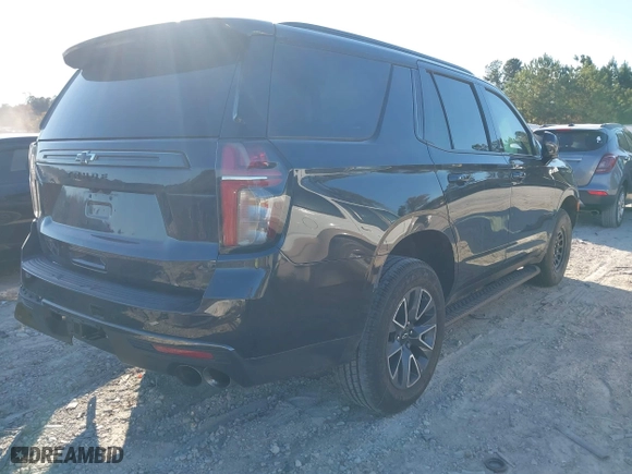 2022 Chevrolet Tahoe Z71 with VIN 1GNSKPKL7NR333664, listed as a IAAI auction lot 41010745 with 92,469 mi miles. Bid and sale history available at carsss.com. Image 4.