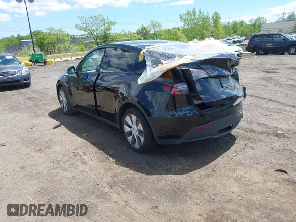 2023 Tesla Model Y Long Range with VIN 7SAYGDEE0PA183891, listed as a IAAI auction lot 42205573 with 41,273 mi miles and . Bid and sale history available at DreamBid. Image 3.