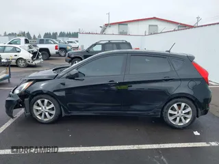 2012 Hyundai Accent SE with VIN KMHCU5AE1CU035390, listed as a IAAI auction lot 41765900 with 127,685 mi miles. Bid and sale history available at carsss.com. Image 14.