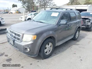 2010 Ford Escape XLT with VIN 1FMCU0D73AKC67711, listed as a IAAI auction lot 41891915 with 254,378 mi miles. Bid and sale history available at carsss.com. Image 2.