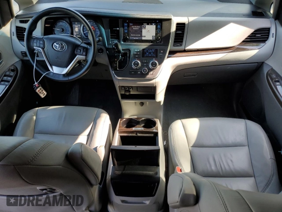 2017 Toyota Sienna XLE with VIN 5TDDZ3DC7HS176274, listed as a Copart auction lot 59899245 with 58,325 mi miles and Salvage title. Bid and sale history available at DreamBid. Image 8.