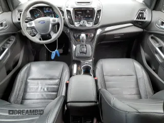 2015 Ford Escape Titanium with VIN 1FMCU0JX5FUA24210, listed as a Copart auction lot 57270855 with 115,613 mi miles and Salvage title. Bid and sale history available at DreamBid. Image 8.