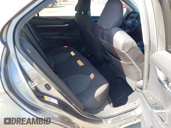 2019 Toyota Camry LE with VIN 4T1B11HK2KU240465, listed as a IAAI auction lot 42095075 with 67,852 mi miles and . Bid and sale history available at DreamBid. Image 8.