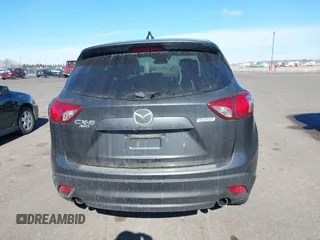 2014 Mazda CX-5 Grand Touring with VIN JM3KE4DY1E0364685, listed as a IAAI auction lot 41665349 with 135,751 mi miles. Bid and sale history available at carsss.com. Image 16.