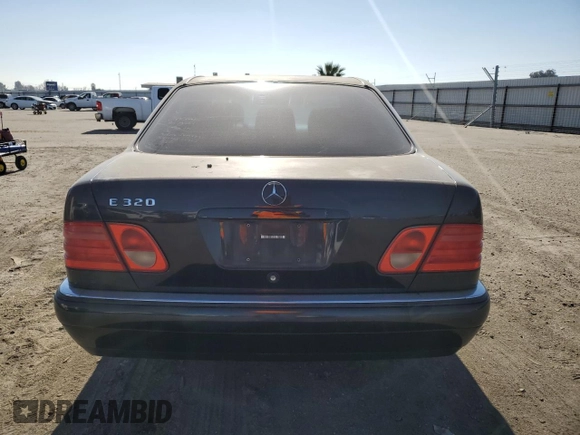 1998 Mercedes-Benz E-Class with VIN WDBJF65F4WA646422, listed as a Copart auction lot 88982785 with 281,524 mi miles and Salvage Title. Bid and sale history available at carsss.com. Image 6.