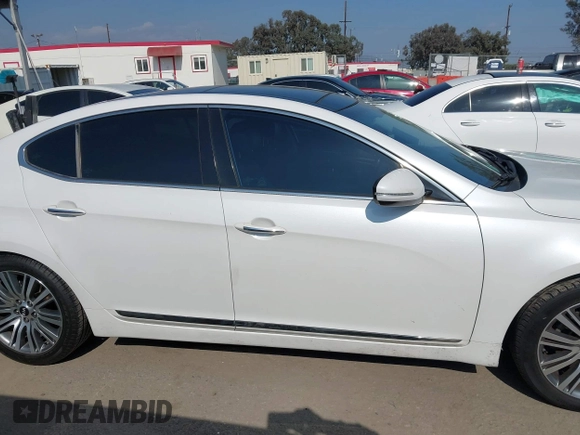 2016 Kia Cadenza Premium with VIN KNALN4D75G5218796, listed as a IAAI auction lot 42151269 with 123,332 mi miles. Bid and sale history available at carsss.com. Image 13.