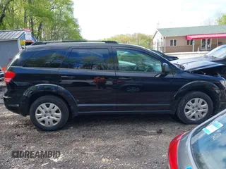 2017 Dodge Journey SE z VIN 3C4PDCAB6HT697631, wystawiony jako IAAI lot #42200146 z przebiegiem 158 511 mil mil oraz . Historia ofert i sprzedaży dostępna na DreamBid. Obrazek 13.