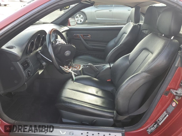 2001 Mercedes-Benz SLK 230/320 z VIN WDBKK65F81F197435, wystawiony jako Copart lot #51114955 z przebiegiem 113 869 mil mil oraz Szkoda całkowita • Salvage title. Historia ofert i sprzedaży dostępna na DreamBid. Obrazek 7.