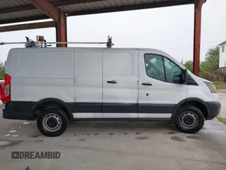 2015 Ford Transit Cargo z VIN 1FTNR1ZMXFKA45161, wystawiony jako IAAI lot #42181449 z przebiegiem 130 096 mil mil oraz . Historia ofert i sprzedaży dostępna na DreamBid. Obrazek 13.