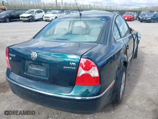 2001 Volkswagen Passat GLX with VIN WVWTH63B51E124484, listed as a IAAI auction lot 42043719 with 42,585 mi miles. Bid and sale history available at carsss.com. Image 4.